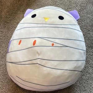 A Halloween costume squishmallow.